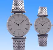 Handcrafted designers art jewelry wholesale manufacturers supply standing out round face fashion watch set with tight set puzzle band design. 