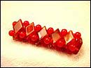Personalized gift body art decor huge online selection wholesale fashion stretchy bracelet with multi rounded red beads and diamond shape sesshell embedded. Delicate and feminine, this gorgeous bracelet creates the warmth of spring all year round. A lovely look. 