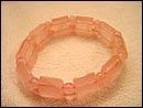 Fashion trend 2005 online wholesale  rose quartz beads forming fashion stretchy bracelet. Rose quartz can enhance emotional balance. Very good for expressing and soothing emotions. You can still benefit from this bracelet jewelry form its perfect pinky rose color.