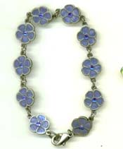 Unique handcrafted gift accesory online shop offering charm bracelet with multi enamel blue color flower pattern decor. A great gift suitable for every age!
