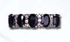 Vintage jewelry accessory collection online manufacturing sterling silver ring with 5 oval garnet stone inlay in middle. 