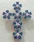 Traditional religious design on new trendy fashion. Multi blue and clear cz forming flower cross charm. All women love it. Perfect for gift giving!